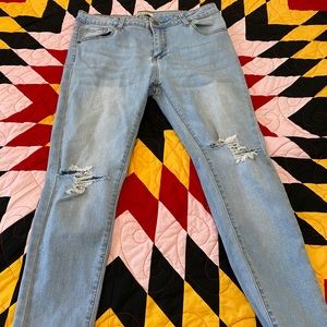 Light wash distressed skinny jeans